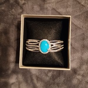 Robin's egg blue Turquoise anddiamond cuff bracelet.Rhodium oversterling silver.
